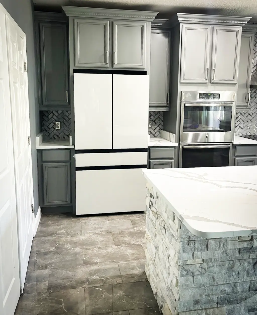 Exotic stones like Cristallo Quartzite and Onyx.
